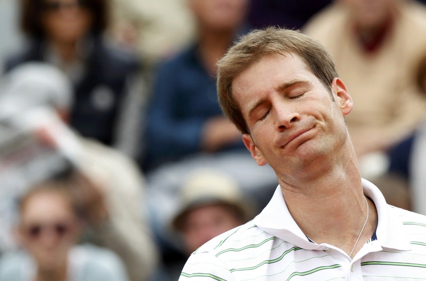 Mayer of Germany reacts during his match against Falla to Colombia during the French Open tennis tournament at the Roland Garros stadium in Paris