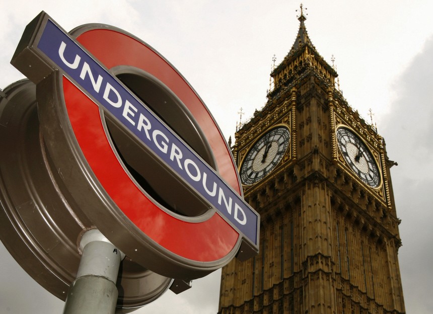 A  London underground sign is pictured below Big Ben, London