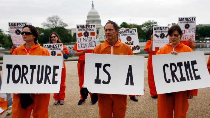 Human Rights Activists Rally For Investigation Into Bush Administration