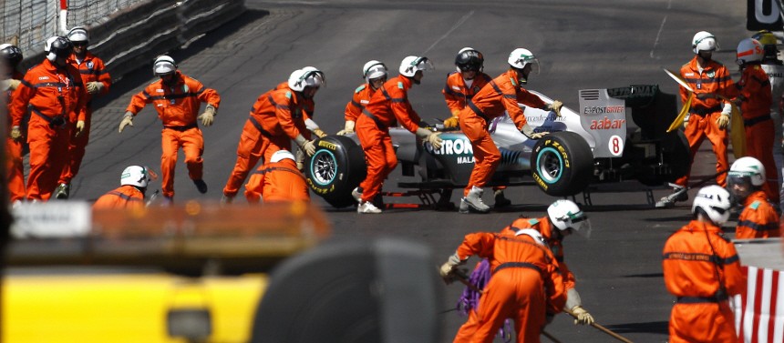 The car of Mercedes Formula One driver Rosberg of Germany is removed following a crash at the tunnel exit during the third free practice session of the Monaco F1 Grand Prix
