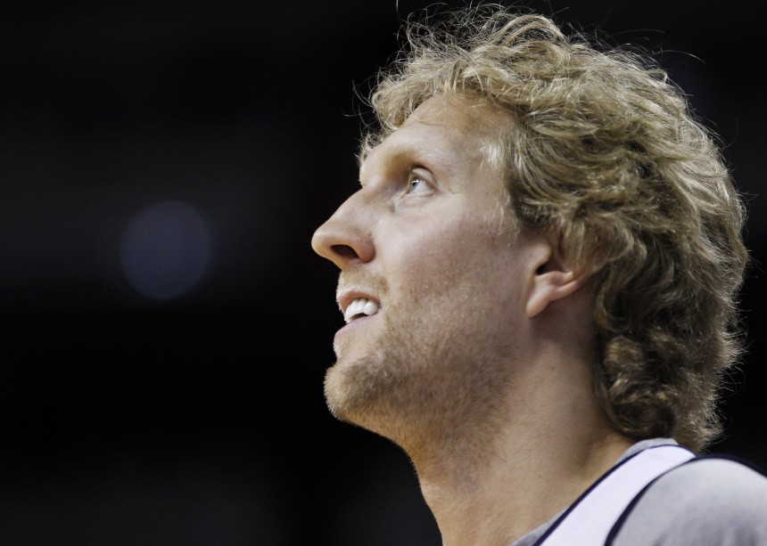 Mavericks' Nowitzki looks on during practice as they prepare for the NBA basketball finals in Miami