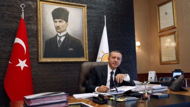 Turkey's PM Erdogan poses for Reuters at his office at the AK Party headquarters in Ankara