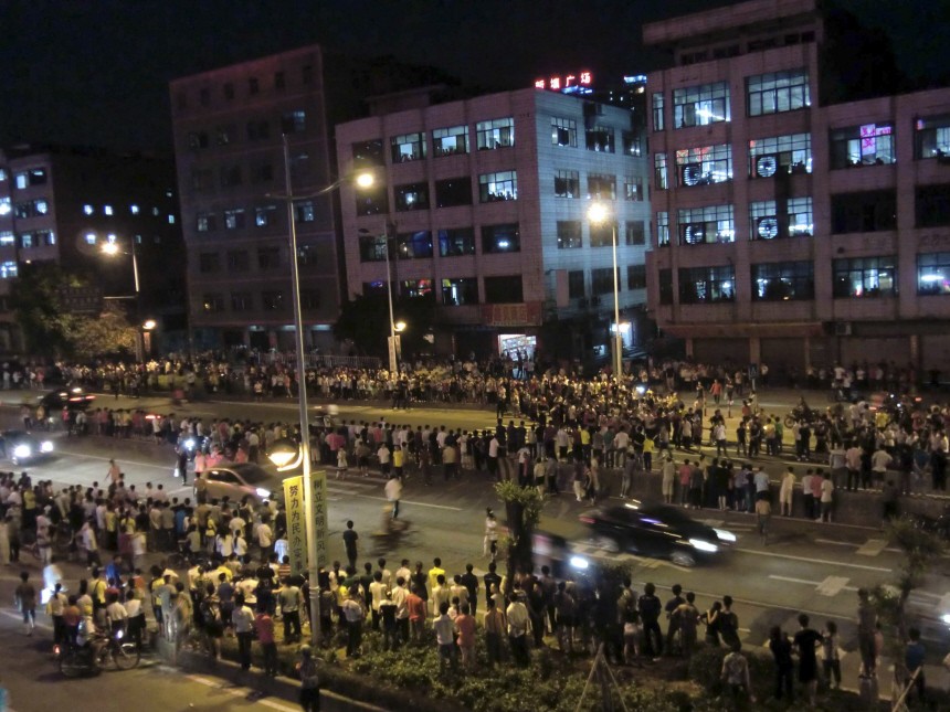Hundreds of protesters standoff with riot police at a township in Zengcheng near the southern Chinese city of Guangzhou