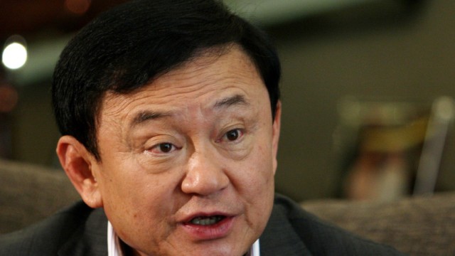 Thailand's former Prime Minister Thaksin Shinawatra speaks during an interview with Reuters at his residence in Dubai