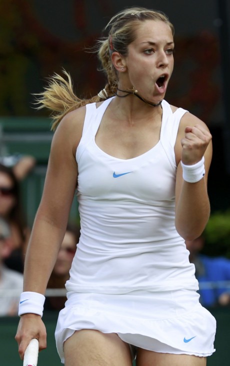 Sabine Lisicki of Germany reacts during her match against Misaki Doi of Japan at the Wimbledon tennis championships in London