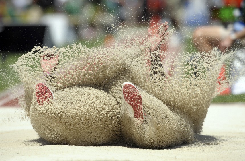 Bryce Lamb lands in the pit during the men's long jump at the U.S. Outdoor Track and Field Championships
