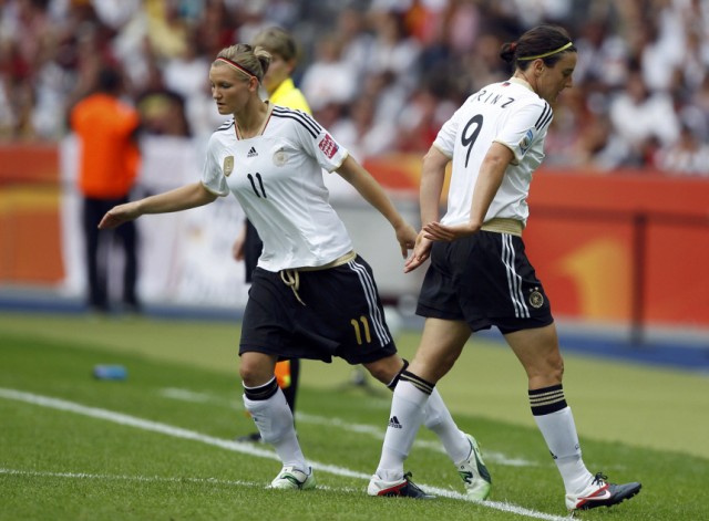 Popp of Germany replaces team mate Prinz during their Women's World Cup Group A soccer match against Canada in Berlin