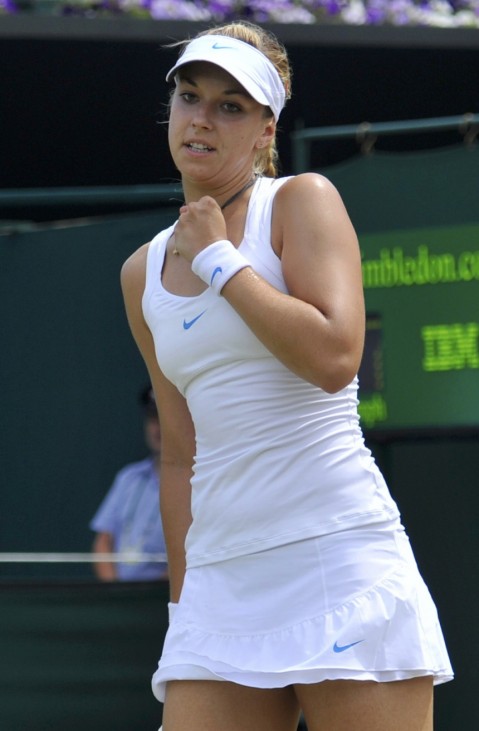 Sabine Lisicki of Germany reacts during her match against Petra Cetkovska of the Czech Republic at the Wimbledon tennis championships in London