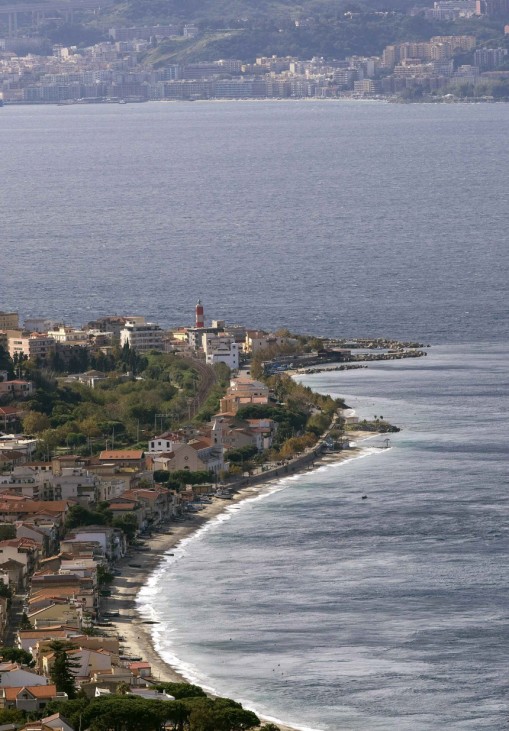 A general view shows the straits of Messina and island of Sicily in the background, as seen from the small fishing village of Cannitello