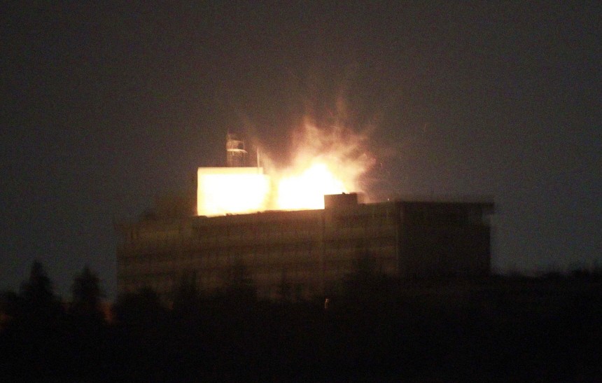 Roof of Intercontinental hotel is lit up by explosion during battle between NATO-led forces and suicide bombers and Taliban insurgents in Kabul