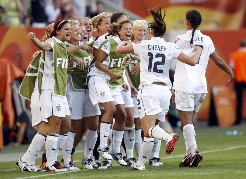 Cheney the U.S. celebrates her goal with team mates during their Women's World Cup Group C soccer match against Nortk Korea in Dresden