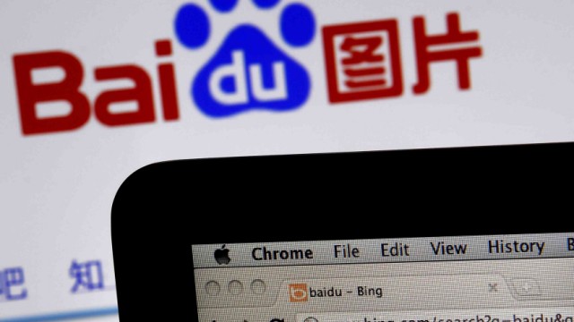 A photo illustration shows the websites of search engines Baidu and Bing on computer screens in Shanghai