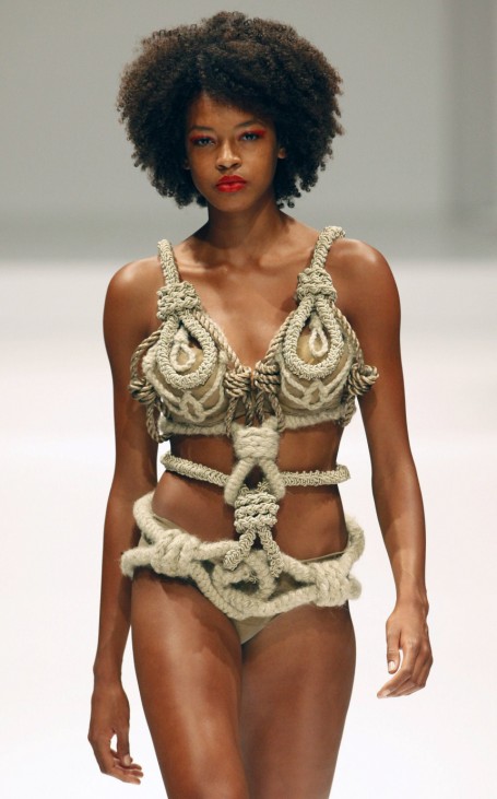 A model presents a creation at the Triumph Inspiration Award lingerie show during the Berlin Fashion Week Spring/Summer 2012 in Berlin