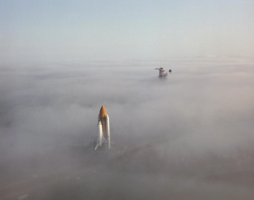 NASA handout photo of Space Shuttle Challenger moving through the fog at Kennedy Space Center