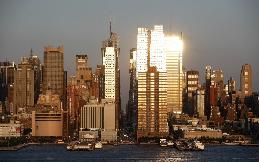 Sun illuminates 42nd Street at sunset during the biannual occurrence named 'Manhattanhenge' in New York