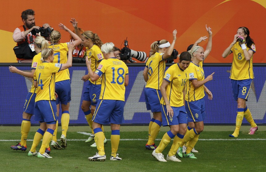 Schelin of Sweden celebrates with her teammates after scoring against France during their Women's World Cup third place soccer match in Sinsheim