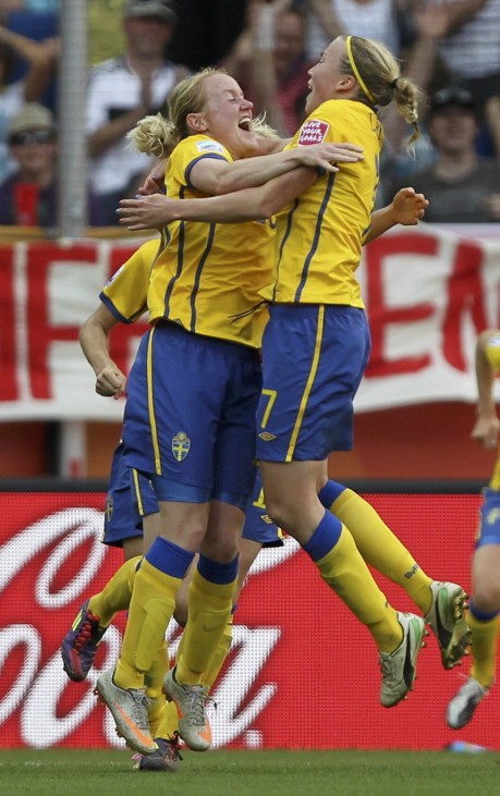 Hammarstrom of Sweden celebrates with her teammates after scoring against France during their Women's World Cup third place soccer match in Sinsheim