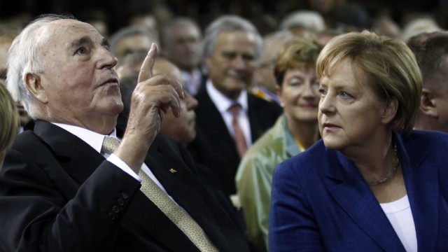 Former German Chancellor Kohl and German Chancellor Merkel attnd a ceremony of Christian Democratic Union (CDU) party to mark the upcoming 20-year anniversary of the German unification in Berlin