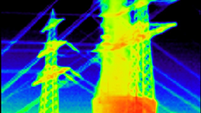 An image taken with a thermographic or infrared camera shows the reactor building of the EnBW nuclear power plant in Philippsburg