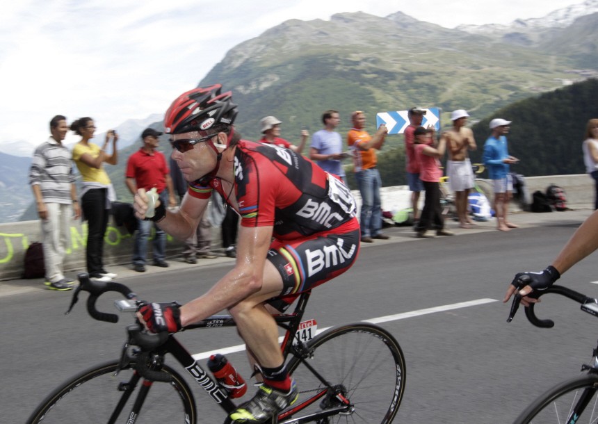 BMC Racing Team's Cadel Evans of Australia drinks during the 19th stage of the Tour de France 2011 cycling race from Modane to Alpe d'Huez