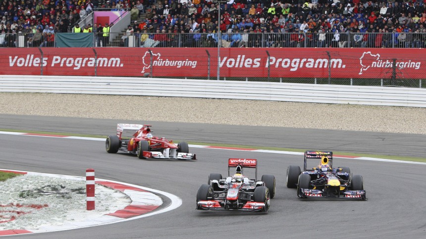 McLaren Formula One driver Hamilton of Britain leads Red Bull driver Webber of Australia and Ferrari driver Alonso of Spain drive during the German F1 Grand Prix at the Nuerburgring