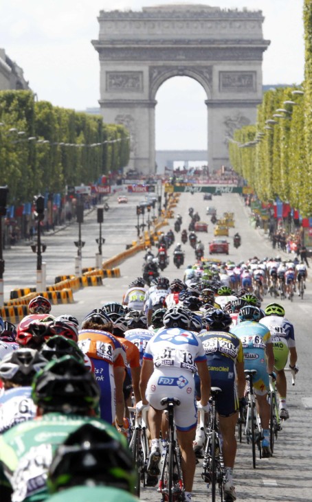 The pack of riders cycles on the Champs Elysees in Paris during the final stage of the 98th Tour de France cycling race between Creteil and Paris