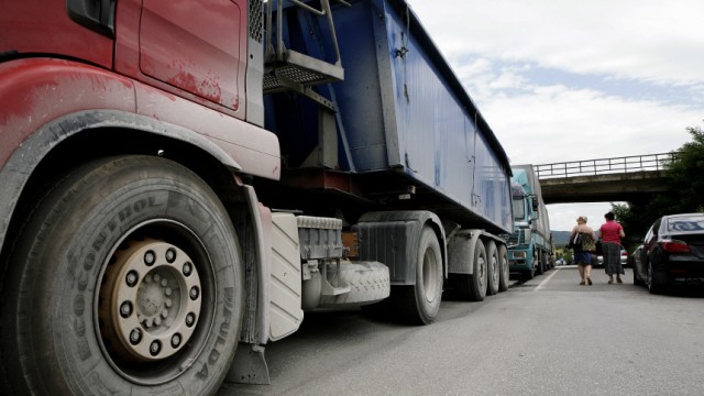 Trucks with goods from Serbia are stopped and turned back at the Merdare border crossing point between Kosovo and Serbia