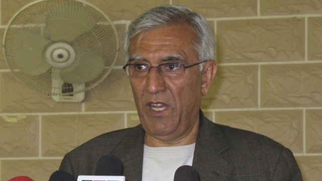 Undated photograph shows Ghulam Haidar Hamidi, mayor of Kandahar city, speaking during a news conference in Kandahar