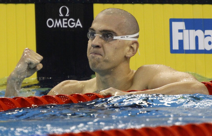 Hungary's Cseh reacts after completing his men's 200m individual medley semifinal at the 14th FINA World Championships in Shanghai
