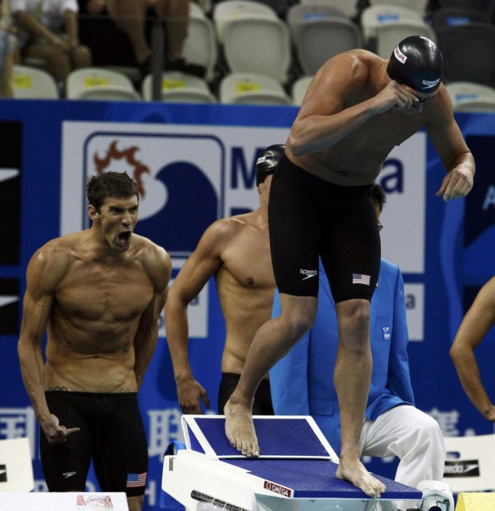 Phelps of U.S. shouts at his teammate Lochte, who is about to start in men's 4 X 200m freestyle relay final at 14th FINA World Championships in Shanghai
