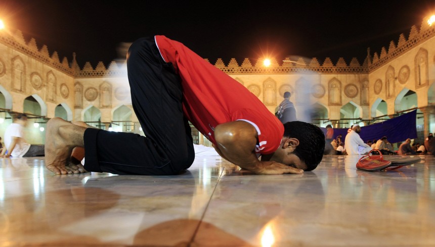 A Muslim man attends an evening prayer to mark the beginning of the holy fasting month of Ramadan, in Cairo