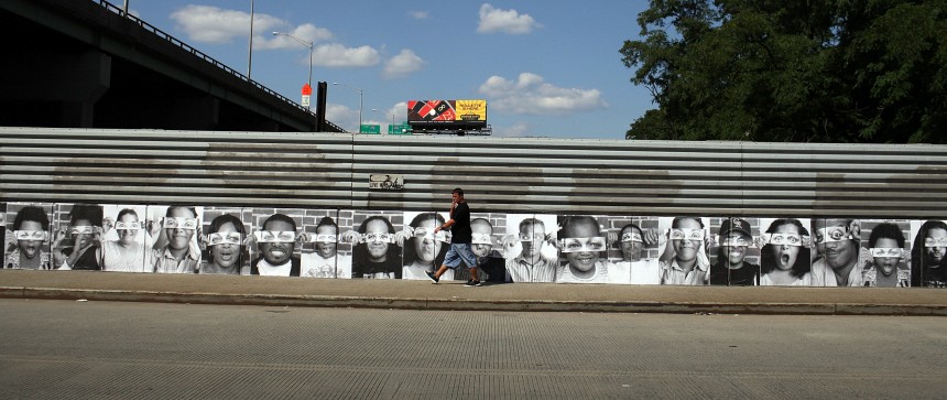 French Street Artist JR Installs Large Scale Portraits In The Bronx