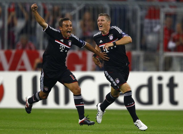 Schweinsteiger of Bayern Munich celebrates his goal against FC Zurich during their Champions League play-off first leg soccer match in Munich
