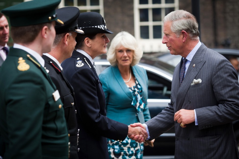 Prince Charles, Prince of Wales and Camilla, Duchess Of Cornwall Visit Residents Affected By The Riots