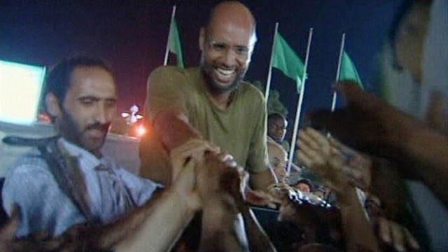 Frame grab of Saif Al-Islam, son of Libyan leader Muammar Gaddafi, shaking hands with supporters in Tripoli