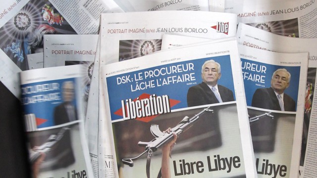 View of front page of French daily morning newspaper Liberation in La Courneuve