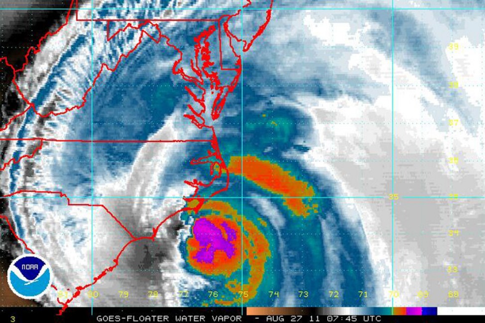 NOAA handout showing the visible shortwave infrared image taken by the GOES-13 satellite, with a water vapor filter applied, of Hurricane Irene off the East Coast of United States