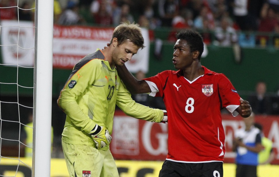 Austria's Gruenwald and Alaba react during their Euro 2012 Group A qualifying soccer match against Turkey in Vienna