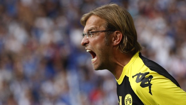 Borussia Dortmund's coach Klopp reacts during the German first division Bundesliga soccer match against Hertha Berlin in  Dortmund