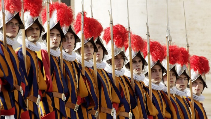File photo of Swiss guards standing at attention in Saint Peter's square