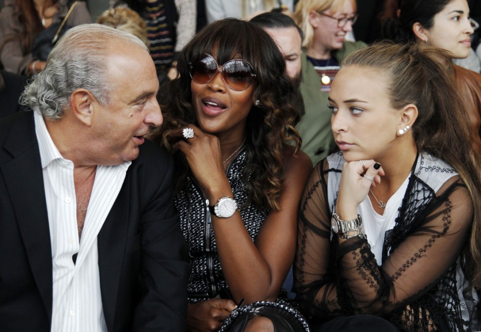 Philip Green and daughter Chloe talk with model Naomi Campbell before the Topshop Unique 2012 Spring/Summer collection show during London Fashion