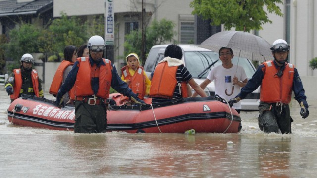 A family is rescued from a flooded area in Nagoya
