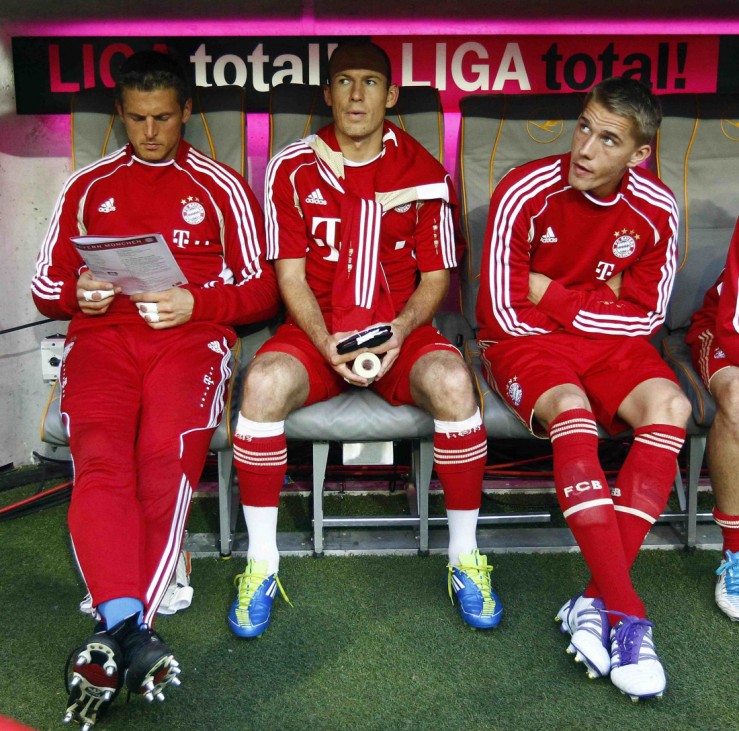 Bayern Munich's star Robben sits on the substitute bench before the German first division Bundesliga soccer match against Bayer 04 Leverkusen in Munich