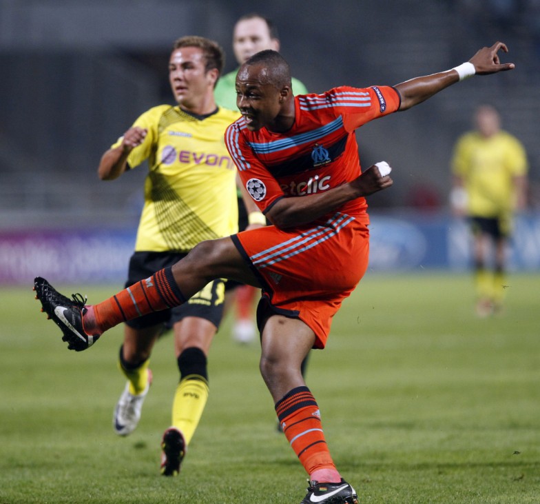 Olympique Marseille's Ayew scores a goal against Borussia Dortmund during UEFA Champions League soccer match at the Velodrome stadium in Marseille