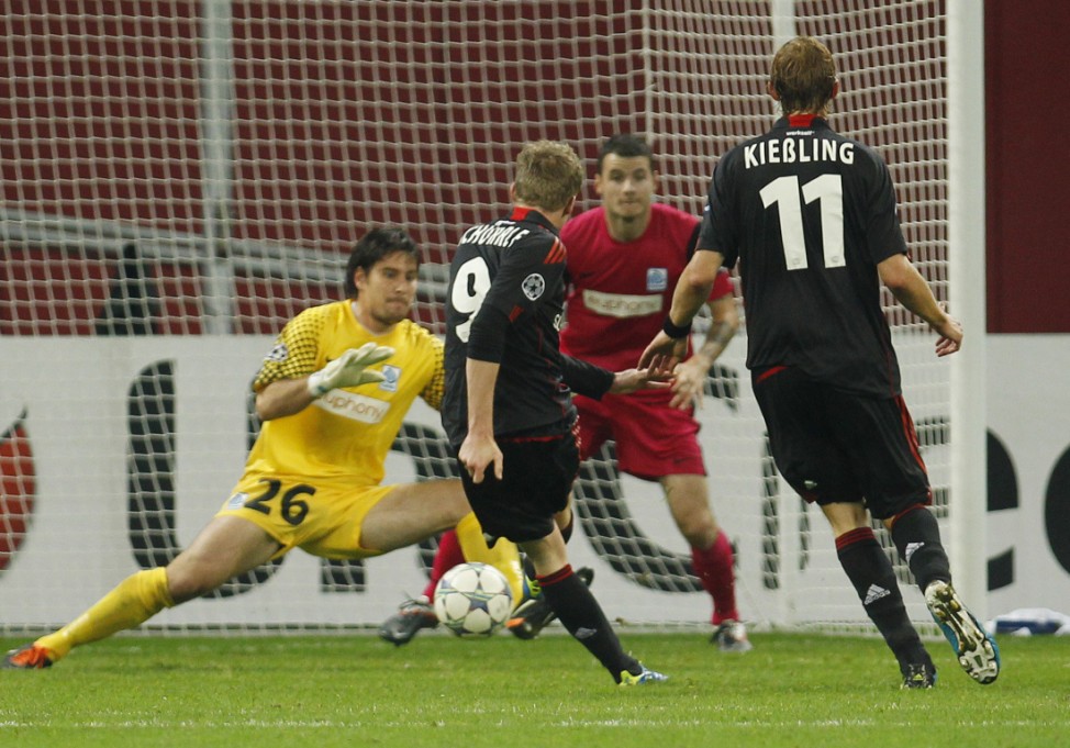Bayer Leverkusen's Schuerrle tries to score against Genk during the Champions League Group E soccer match in Leverkusen