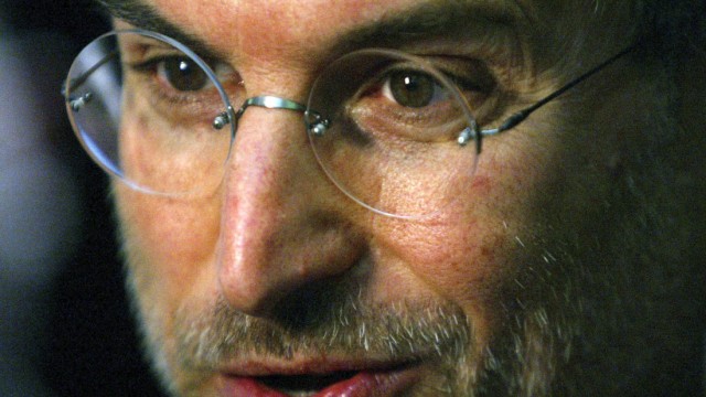 File photo of Apple CEO Steve Jobs speaking to the media at the launch of the European iTunes online music store in London