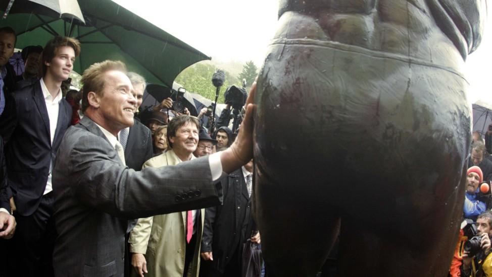 Austrian actor and former California governor Schwarzenegger unveils a statue of himself in a bodybuilding pose in Thal