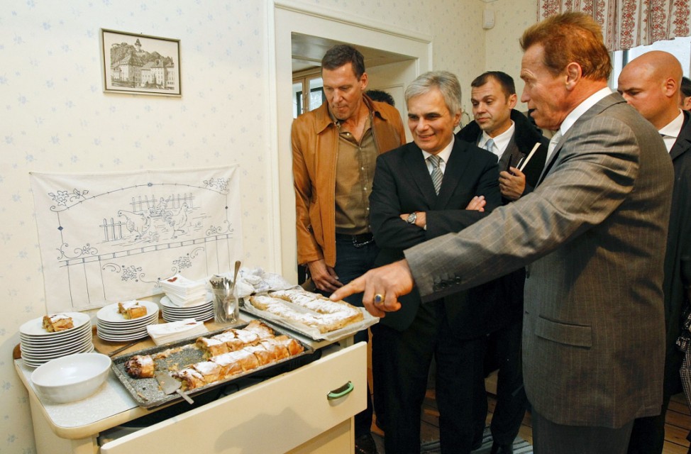 Austrian actor and former California governor Schwarzenegger tours inside his former home in Thal