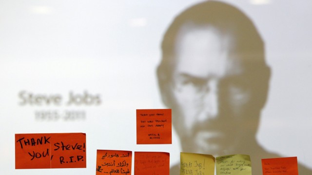 Tributes to the late Steve Jobs are posted at an Apple Store in Kuala Lumpur