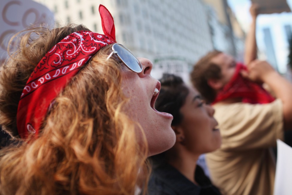 Occupy Wall Street Protestors March Down New York's Fifth Avenue